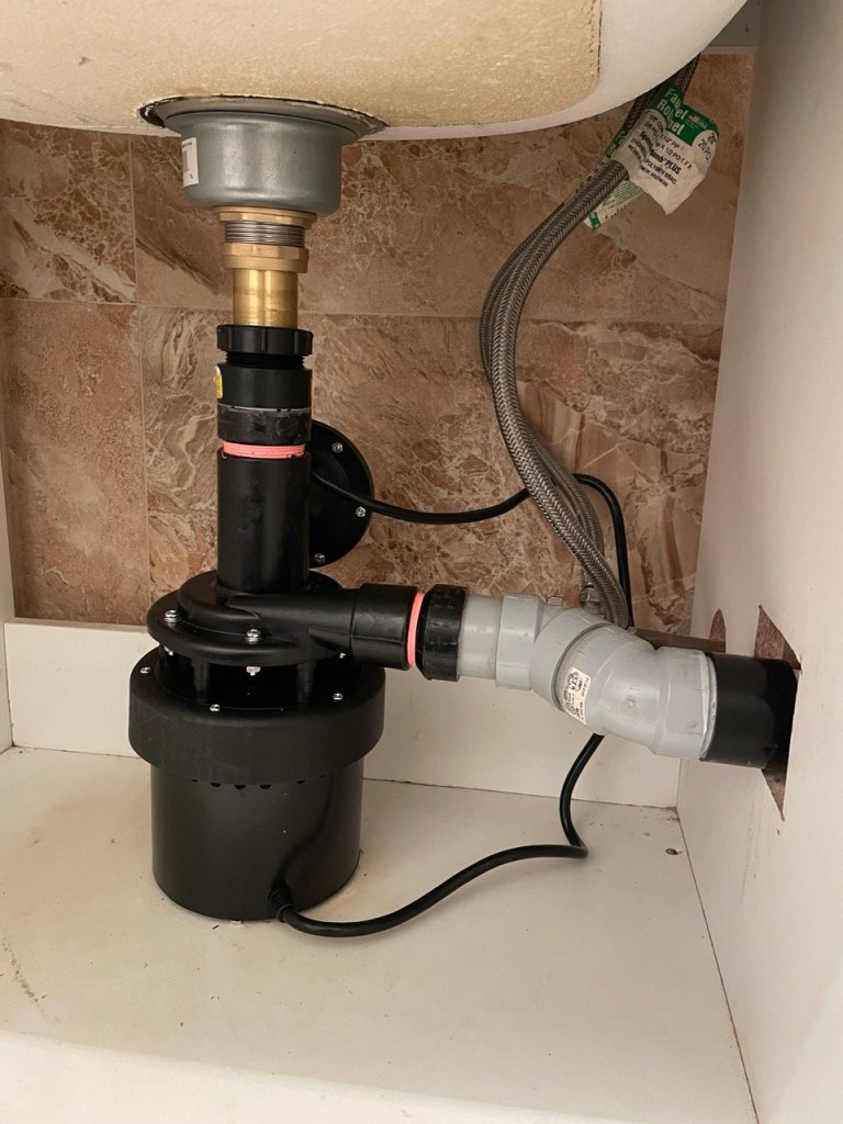 Sink drain sewage pump